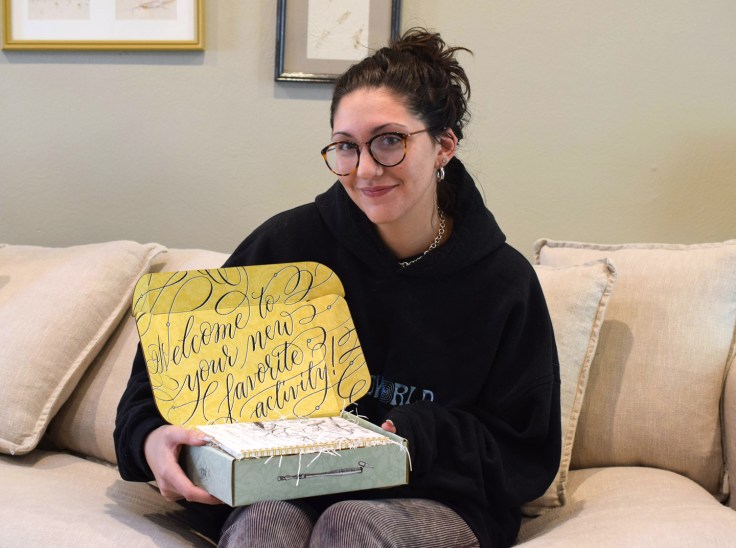This is packager Katie with a calligraphy kit.
